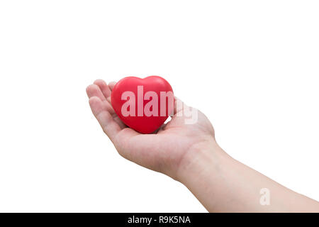 Rotes Herz Kugel: Druckhelfer foam ball Die rote Herz Form auf Frau hand auf weißem Hintergrund mit Freistellungspfad isoliert Stockfoto