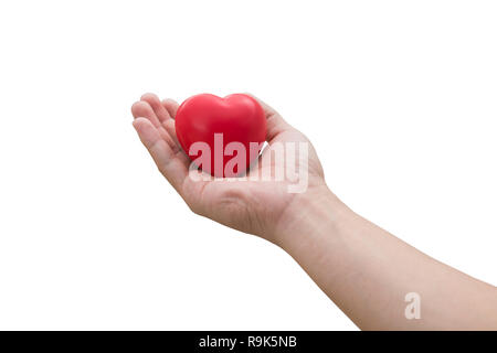 Rotes Herz Kugel: Druckhelfer foam ball Die rote Herz Form auf Frau hand auf weißem Hintergrund mit Freistellungspfad isoliert Stockfoto