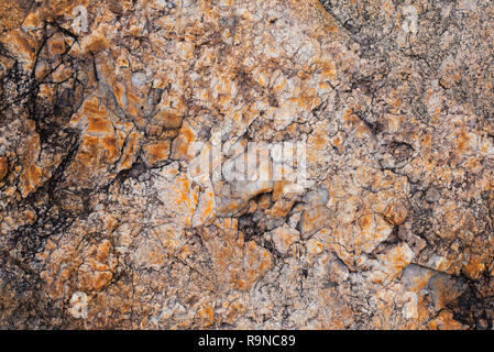 Granitfelsen erstellen Sie schöne Texturen. Stockfoto