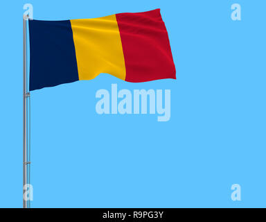 Isolieren Flagge Tschad an einem Fahnenmast im Wind flattern auf blauem Hintergrund, 3D-Rendering Stockfoto