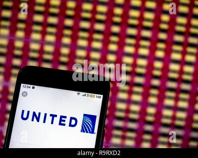 Dezember 14, 2018 - Kiew, Ukraine - United Airlines logo gesehen auf einem Smartphone angezeigt. (Bild: © Igor Golovniov/SOPA Bilder über ZUMA Draht) Stockfoto