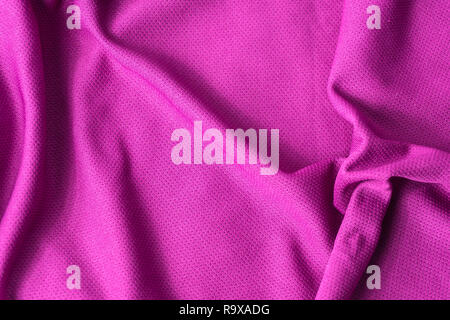 Rosa stoffgemustert Hintergrund. Sport rosa Bekleidung Stoff Jersey texturiert. Stockfoto