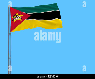 Isolieren Flagge Mosambik auf einem Fahnenmast im Wind flattern auf blauem Hintergrund, 3D-Rendering Stockfoto