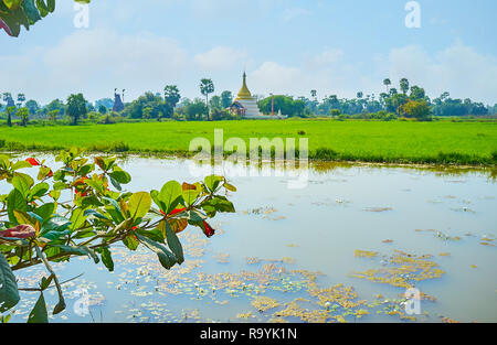Genießen Sie die Natur der Ava (inwa), die Beobachtung der Paddy-Felder, Wälder, Wassertanks und tropischen Pflanzen, Myanmar. Stockfoto