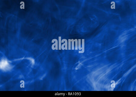 Blaue Farbe Tinte geflossen in Wasser. Abstrakt Blau Farbe Muster Hintergrund. Stockfoto
