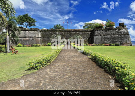 Fort Santa Isabel-Real Fuerza y Presidio de Santa Isabel-Kutang Santa Isabel Haupteingang inmitten der Korallen Kalkstein-Wand von der Umge Stockfoto