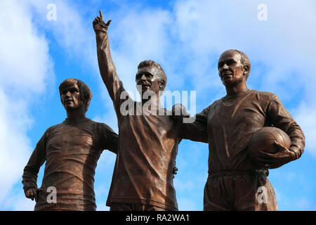 Die Vereinigten Trinity Bildhauer von Philip Jackson, von Manchester United 'Old Trafford' Masse, Manchester, England, Großbritannien Stockfoto