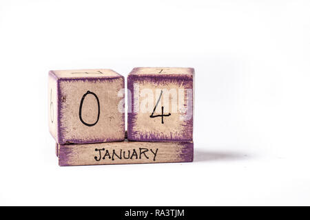 Wooden Block Ewiger Kalender angezeigt. Januar 4. Stockfoto