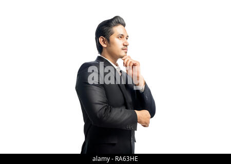 Portrait von asiatische Geschäftsmann mit der Hand am Kinn denken etwas auf weißem Hintergrund Stockfoto