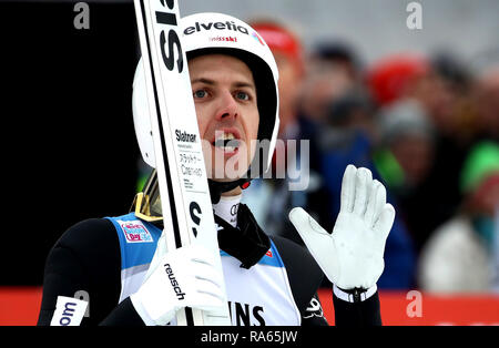 Garmisch Partenkirchen, Deutschland. 01 Jan, 2019. Skispringen: Vierschanzentournee, große Hügel, meine Herren. , Skispringer Simon Ammann aus der Schweiz, reagiert, in der 2. Credit: Daniel Karmann/dpa/Alamy leben Nachrichten Stockfoto