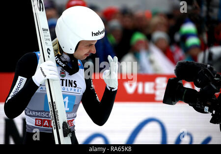 Garmisch Partenkirchen, Deutschland. 01 Jan, 2019. Skispringen: Vierschanzentournee, große Hügel, meine Herren. , Skispringer Simon Ammann aus der Schweiz, reagiert, in der 2. Credit: Daniel Karmann/dpa/Alamy leben Nachrichten Stockfoto