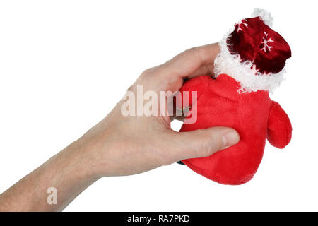 Der Großvater hält in seiner Hand ein Red velvet handgefertigte Santa Claus Spielzeug. Bald wird es Geschenke für Enkel unter dem Weihnachtsbaum. Isolieren Stockfoto