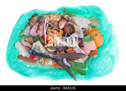 Essen Abfälle, die nach dem Kochen in grün Beutel bleiben. Isolierte makro Studio gedreht. Die Macht der Menschheit in das zukünftige Konzept Stockfoto