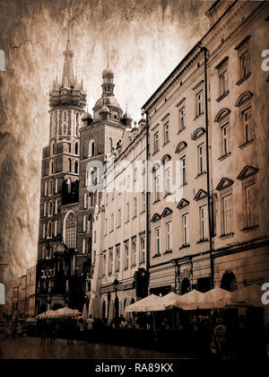 St.-Mary's-Kirche in Krakau, Polen. Bekannt als die Mariacki es auf dem Marktplatz mit seinem märchenhaften Türme zu einem Wahrzeichen in der Stadt steht. Stockfoto