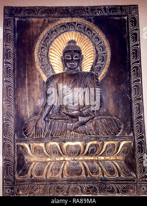 Holz- bas-relief des Buddha in Krakau Polen nur nearmarket Square Stockfoto