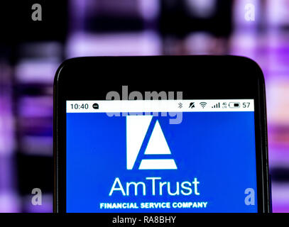Kiew, Ukraine - Jan 2, 2019: AmTrust Financial Services Insurance Company Logo auf dem Smartphone angezeigt Stockfoto
