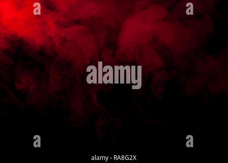Red Smoke auf schwarzen Hintergrund für Wallpaper und Hintergründe Stockfoto
