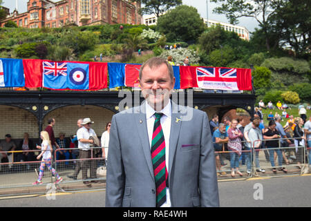 Chief Executive Sir Gary Verity von Willkommen in Yorkshire die Teilnahme an bewaffneten Kräfte Tag in Scarborough, North Yorkshire Stockfoto