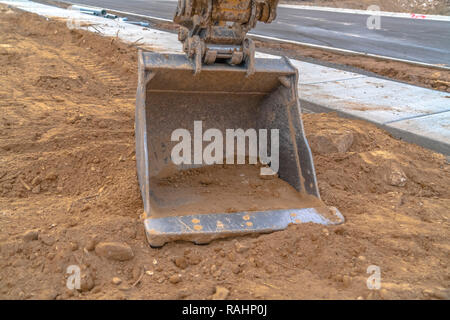 Graben Klaue eines Baggers Nähe zu sehen. Stockfoto
