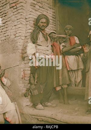 Arbela (Erbil). Irak. Arbela. (Erbil). Zentrum von Ishtar Kult in assyrischer Zeit, 2200 v. Chr. typische Gruppe Mann, jungen Neuerfundene Stockfoto