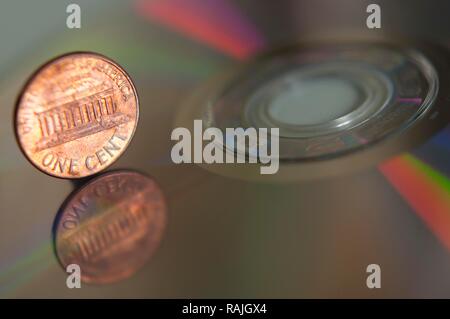 1 Cent, US-Währung, auf einer optischen Disc Stockfoto