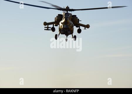 Eine irakische Armee aviation Mi-28 N Verwüstung fliegt über eine 9 irakische Armee Division post Befehl nach Unterstützung des Clearing von Bakhaira Dorf und Umgebung am ersten Tag der Schlacht West Mosul, Jan. 19, 2017 zu befreien. 9 IAD ist mit beraten und unterstützen Teams 2 Bataillon partnered, 508Th Parachute Infantry Regiment, 2nd Brigade Combat Team, 82nd Airborne Division. 2 BCT, 82nd Abn. Div. ist zur Unterstützung der Operation inhärenten Lösung bereitgestellt, die irakischen Sicherheitskräfte, die Partner durch die Mission zu ermöglichen, zu beraten und zu unterstützen, einen Beitrag Planung, Intelligence and Analysi Stockfoto