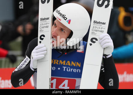 Innsbruck, Österreich. 04 Jan, 2019. Ski Nordisch/Skispringen: Weltcup, Vierschanzentournee Großschanze, Männer, 2. Runde. Simon Ammann aus der Schweiz reagiert. Credit: Daniel Karmann/dpa/Alamy leben Nachrichten Stockfoto