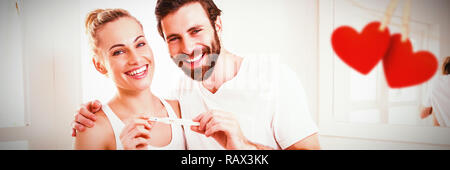 Zusammengesetztes Bild Herz hängt an einer Linie Stockfoto