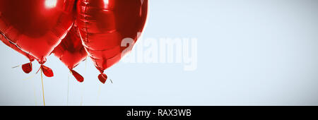 Das zusammengesetzte Bild im roten Herz Ballons Stockfoto
