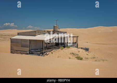 Tin City, Port Stephens, NSW, Australien, im späten 19. Jahrhundert schiffswracks am Stockton Beach, Schuppen errichtet wurden Bestimmungen für die Matrosen zu speichern. Stockfoto