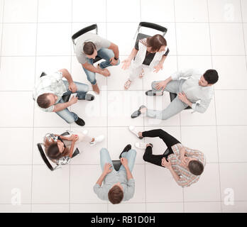 Ansicht von oben. Ein Team von erfolgreichen jungen Mitarbeiter Stockfoto