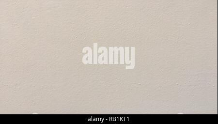 Grunge bemalte Wand Textur als Hintergrund. Konkrete vintage Wand Hintergrund, alte weiß gestrichenen Wand gerissen. Hintergrund gewaschen Malerei Stockfoto