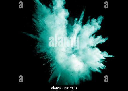 Grüne Farbe pulverexplosion Cloud auf schwarzen Hintergrund. Grün staub Splash für den Hintergrund. Stockfoto