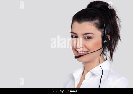 Attraktive junge Menschen, die in einem Call Center. Stockfoto