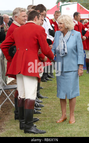 Die Herzogin von Cornwall, Präsident der Süden von England Show trifft Huntsman, wie sie Touren die Show in der Nähe von Ardingly, West Sussex. In der Show "50. Ein Stockfoto