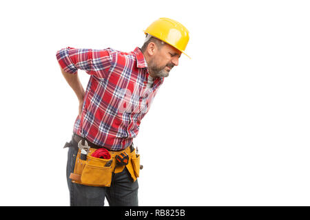 Konstruktor mit betroffenen Ausdruck in starke Rückenschmerzen auf weißem studio Hintergrund isoliert Stockfoto