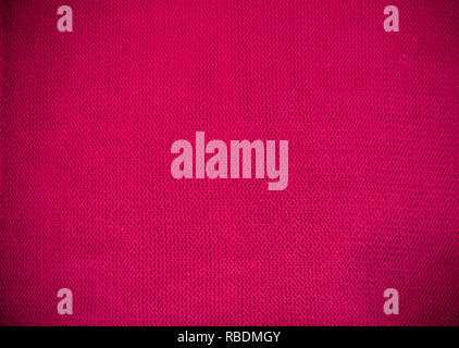 Purple Pink magenta Strickmuster Wollpullover Textur hautnah. Handgefertigte lila Stricken wolle Textur Hintergrund Stockfoto
