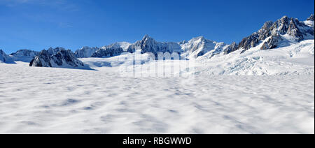 Um Neuseeland - eine Reise an den Anfang der Gletscher Gletscher mit 'Hubschrauber', Franz Josef Glacier - Panorama Stockfoto