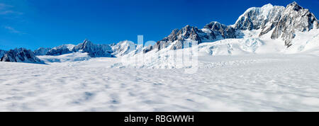 Um Neuseeland - eine Reise an den Anfang der Gletscher Gletscher mit 'Hubschrauber', Franz Josef Glacier - Panorama Stockfoto