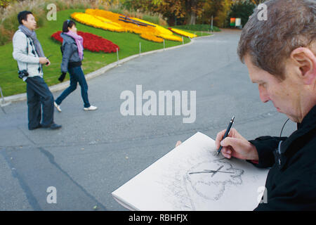 Die Blumenuhr ist eine der beliebtesten Touristenattraktionen in Genf, Schweiz. Stockfoto