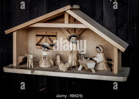 Die Heilige Familie in Holz- Stockfoto