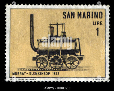 Briefmarke aus San Marino in der Lokomotiven in der Serie 1964 Stockfoto