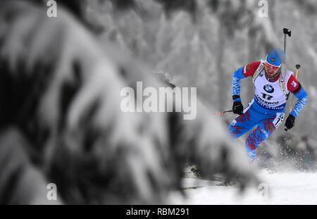 Oberhof, Deutschland. 11 Jan, 2019. Biathlon, Weltmeisterschaft, Sprint 10 km, Männer. Alexander Loginov aus Russland auf der Strecke. Credit: Hendrik Schmidt/dpa-Zentralbild/dpa/Alamy leben Nachrichten Stockfoto