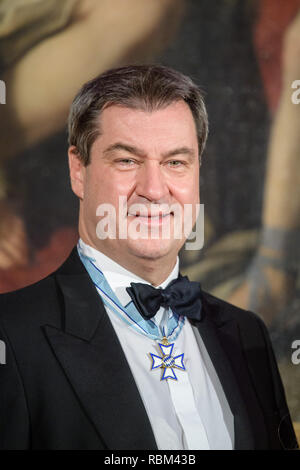 11 Januar 2019, Bayern, München: Markus Söder (CSU), Ministerpräsident von Bayern, erwartet die Gäste auf dem Neujahrsempfang der Bayerischen Staatsregierung in der Residenz. Er trägt mit dem Bayerischen Verdienstorden. Foto: Matthias Balk/dpa Stockfoto