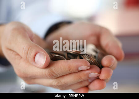 Hand Geschäftsmann, pin Geld Stockfoto