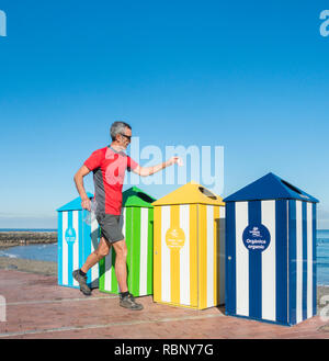 Reifen Jogger/plogger sammeln Müll, wie er läuft. Stockfoto