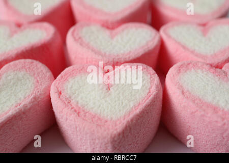 Geschlossen bis Textur von Pastell rosa und weißen Herzförmigen Marshmallow Bonbons, Textur Hintergrund Stockfoto