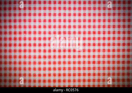 Red textile karierten Tuch Textur mit Vignette. Hintergrund, Küche. Stockfoto