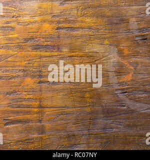 Gelblich golden Textur. Gelb und Orange Hintergrund, lackiert Betonwand. Stockfoto