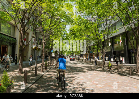 Radfahrer auf Marunouchi, Naka-Dori Chyoda-ku, Tokio, Japan Stockfoto